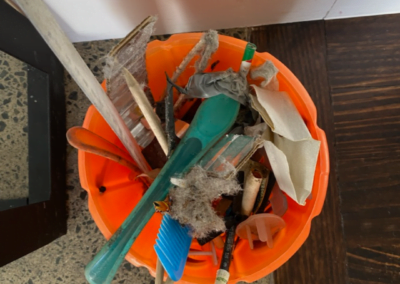 Bucket full of rubbish from a system